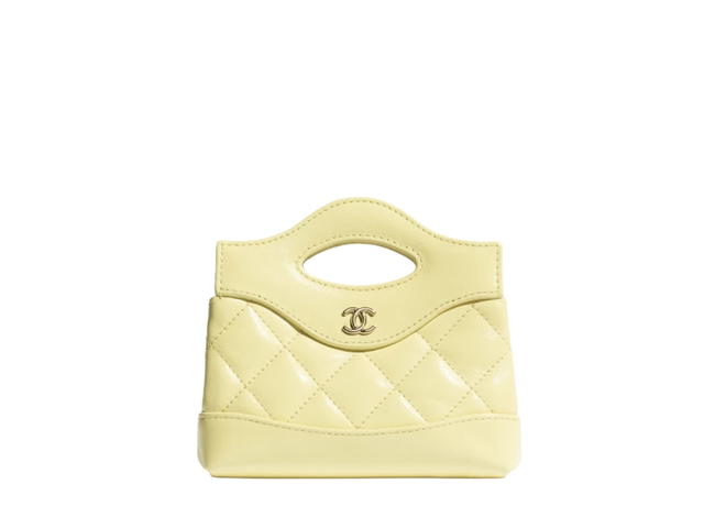 Chanel Chanel Clutch With Chain In Shiny Lambskin With Gold-Tone Metal Light Yellow - view 1