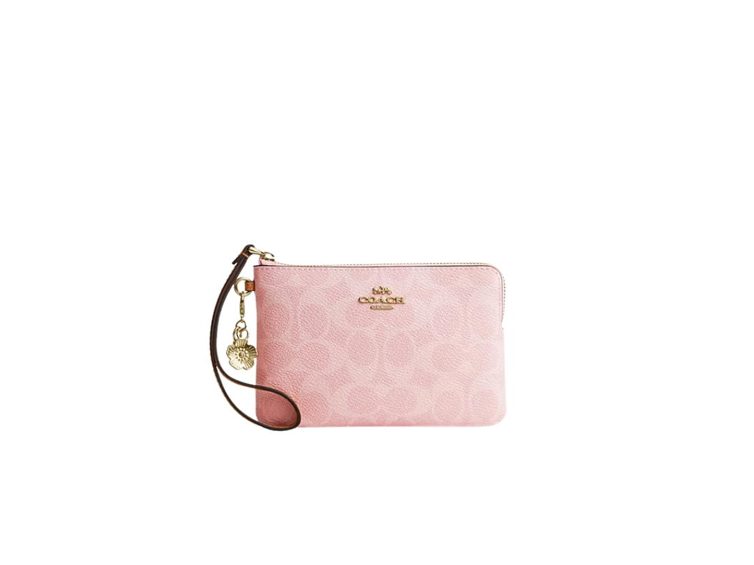 Coach Coach Corner Zip Wristlet In Signature Canvas With Charms Pink