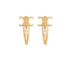 Buy Celine Hair Accessories Set of 2 Triomphe Snap Hair Clips in Brass with Gold Finish and Steel Gold at Sasom – Authentic and Ready to Ship