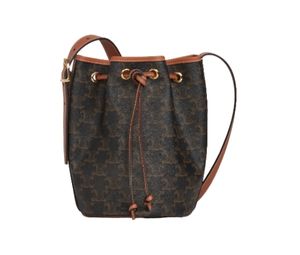 Buy Celine Small Drawstring Bag In Triomphe Canvas And Calfskin With Gold Finishing Tan at Sasom – Authentic and Ready to Ship