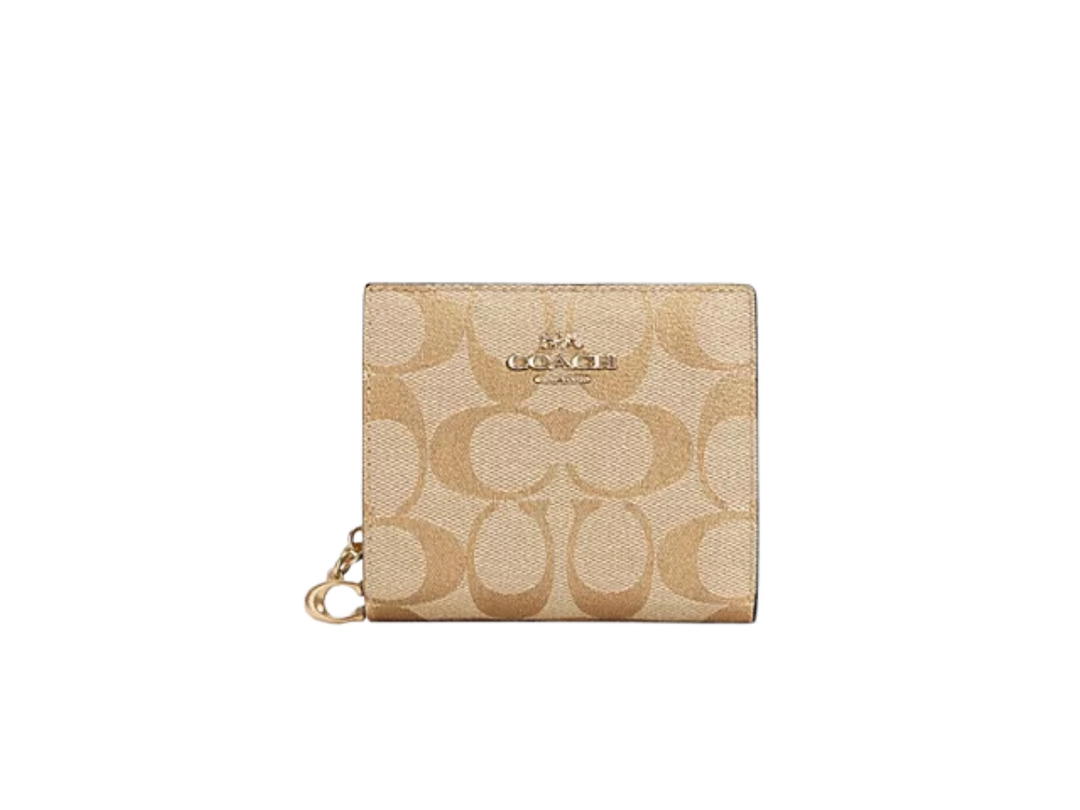 Coach Coach Snap Wallet In Signature Canvas With Gold Tone Hardware Saddle