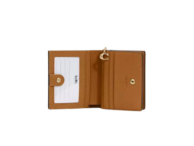 Coach Coach Snap Wallet In Signature Canvas With Gold Tone Hardware Saddle - view 2