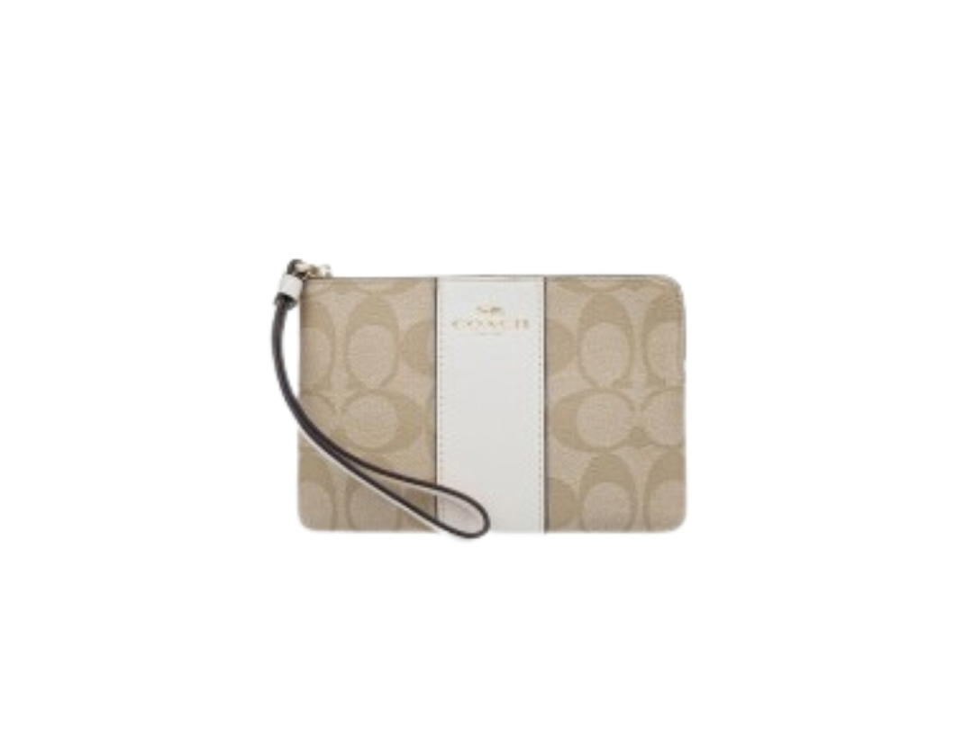 Coach Coach Zip Wristlet In Signature Canvas