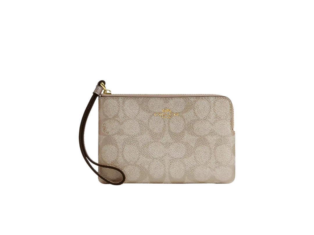 Coach Coach Corner Zip Wristlet In Signature Canvas Im Champagne Multi