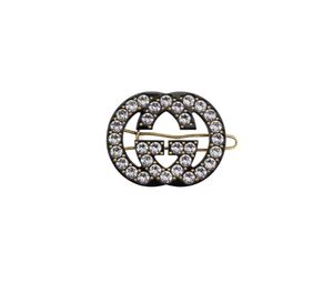 Buy Gucci Crystal Interlocking G Hair Clip Black Resin Gold Metal at Sasom – Authentic and Ready to Ship