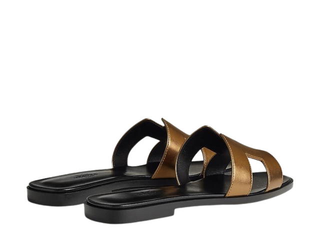 Hermes Hermes Oran Sandal In Calfskin With Metallic Finish And Iconic H Cut-Out Dore Fonce - view 3
