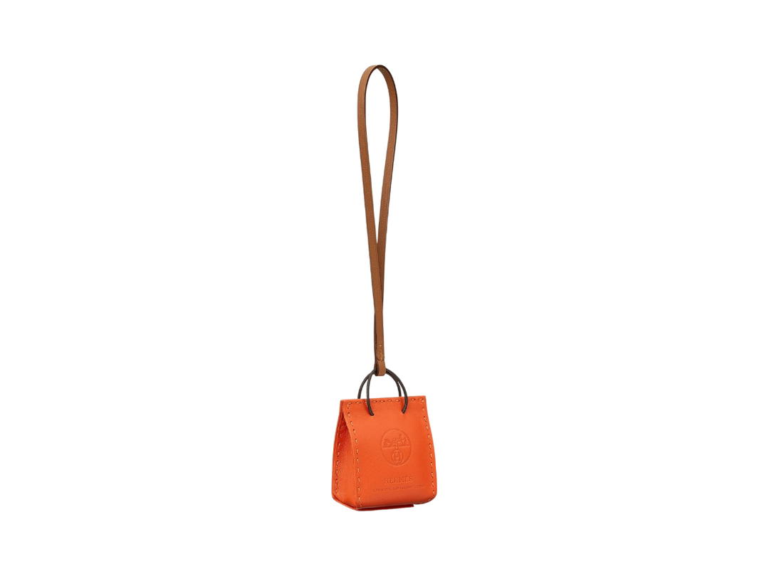 Hermes Hermes Orange Bag Charm In Milo Lambskin-Swift Calfskin With Ex-Libris Hot Stamp Feu-Gold