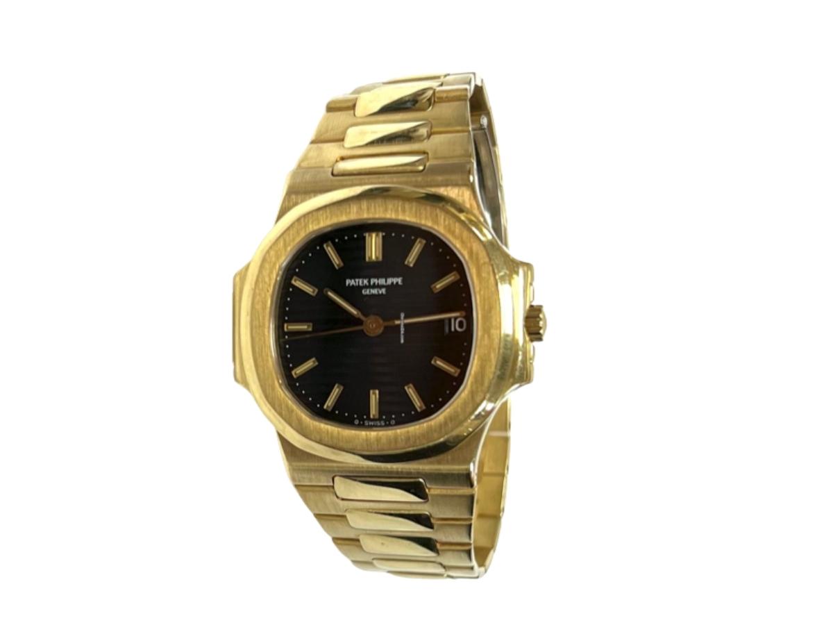 Patek Philippe Patek Philippe Nautilus Yellow Gold Blue Dial